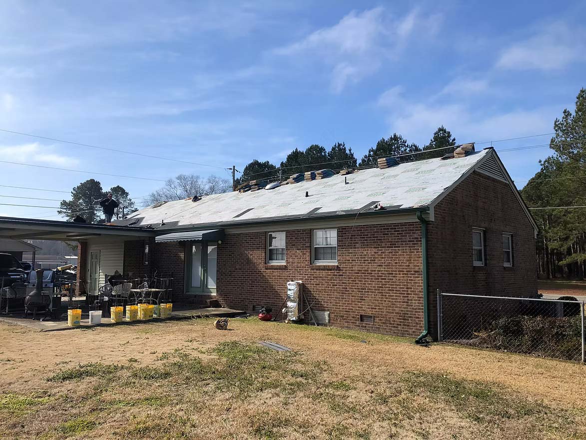 An ongoing residential roof replacement project done by Alliance Roofing
