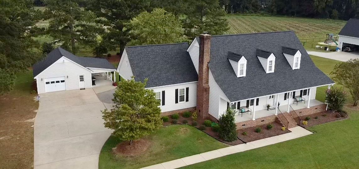 A house with a new roof in Clayton, NC