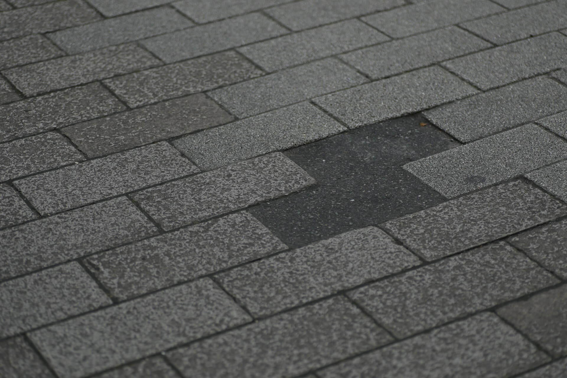 Asphalt shingle roof with missing shingles