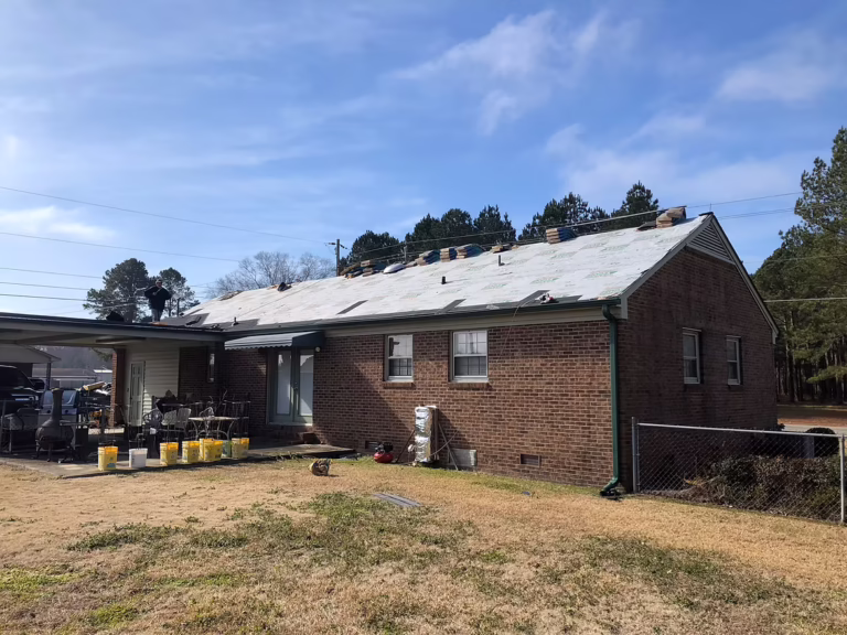A residential roof with newly installed underlayment