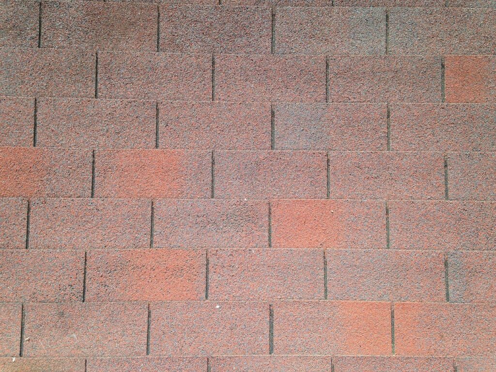 A red asphalt shingles roof